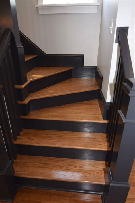 Oak Staircase With Black Painted Trim Risers And Rails