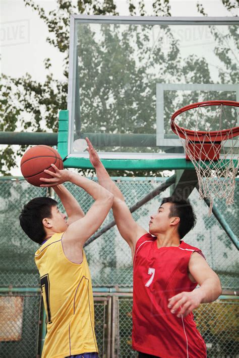 Two People Playing Basket Ball Stock Photo Dissolve