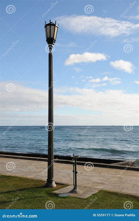 Lamp Post By Ocean Stock Image Image Of Shore Cloudscape 5559177
