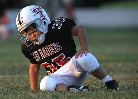 Boy Playing American Football