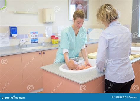 Nurse Bathing Baby Stock Image Image Of Hospital Cleansing 159685497