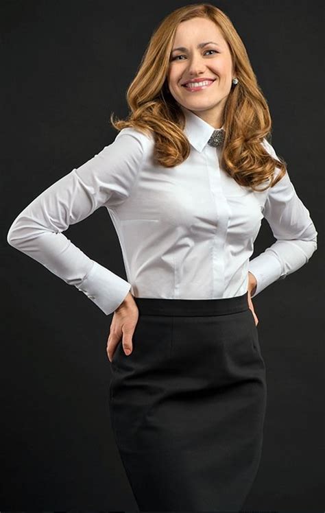 dressed in formal work outfit with white shirt and black pencil skirt women white blouse work