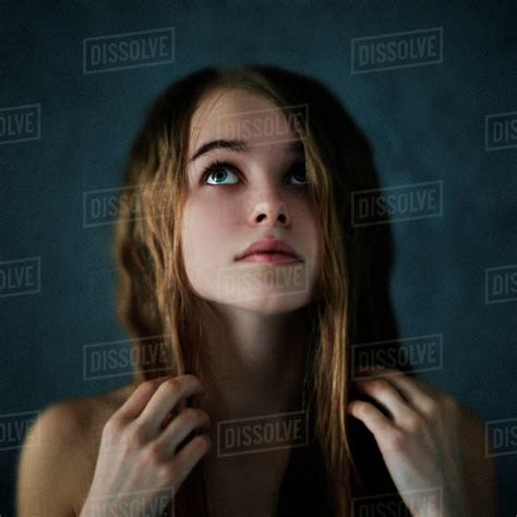 Caucasian Teenage Girl Looking Up Stock Photo Dissolve