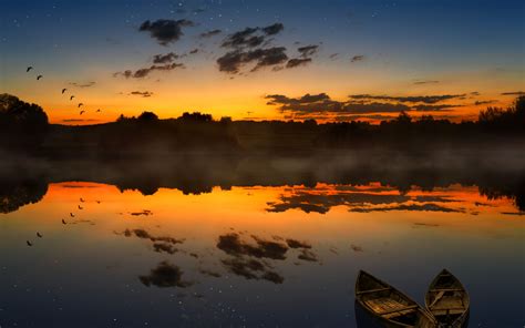 Download Wallpaper 3840x2400 Boats Sunset Lake Horizon Clouds 4k