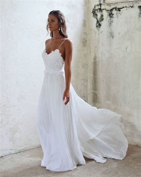 So to help you find the perfect white dress for your bridal shower, bachelorette party, rehearsal dinner, or casual wedding, we've rounded up 15 of the most stylish white wrap dresses on the internet. Knit in a new life with informal wedding dresses - blogdeb.com in 2020 | Coast wedding dress ...