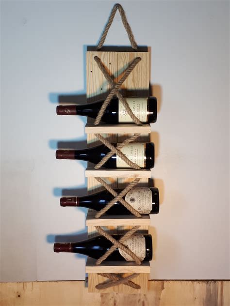 porte bouteilles mural original en bois de palettes et corde 40 euros sur etsy wood wine