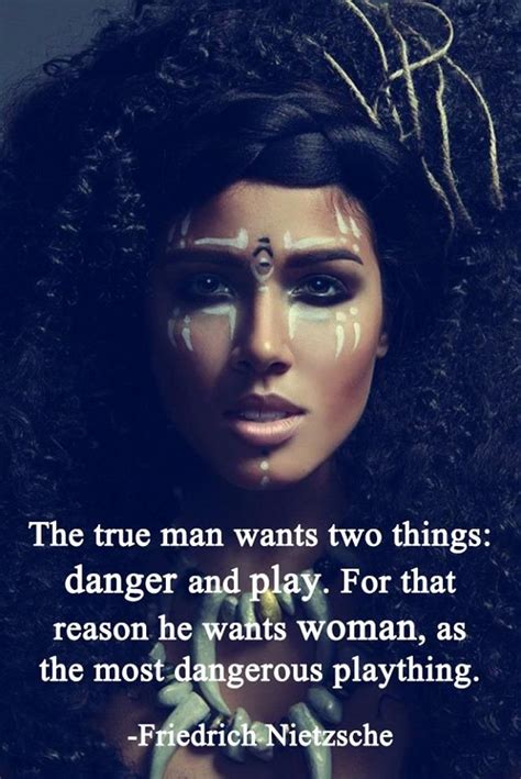 A Woman With Her Face Painted White And The Words The True Man Wants Two Things Danger And Play