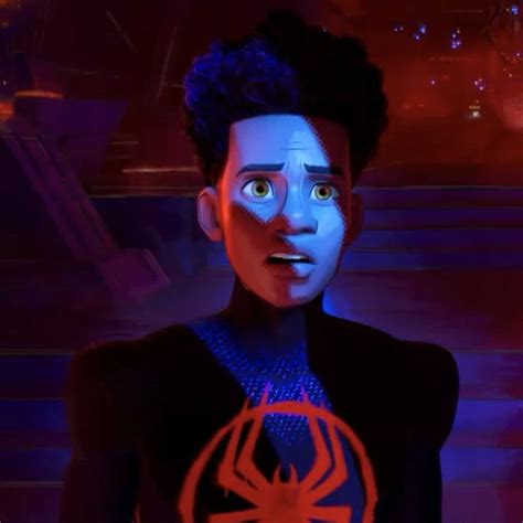 The Animated Spider Man Character Is In Front Of A Red And Blue