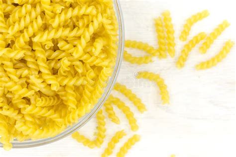 Raw Fusilli Pasta Spiral Shaped Pasta In A Glass Bowl Stock Image