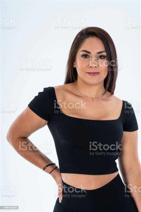 Portrait Of 40 Year Old Latina Woman In Photo Studio Stock Photo