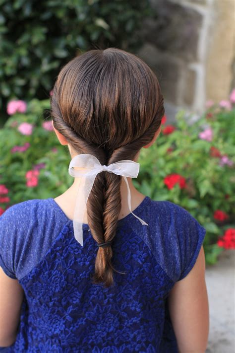 Hair towards one side is left open, and on the other side, the braided ponytails are left. Hairstyles for Girls: Double-Twist Ponytail | Cute Girls ...