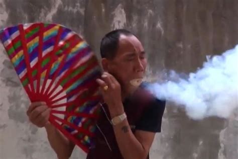 Kung Fu Master Stuffs Sawdust Into His Mouth Sets It Ablaze