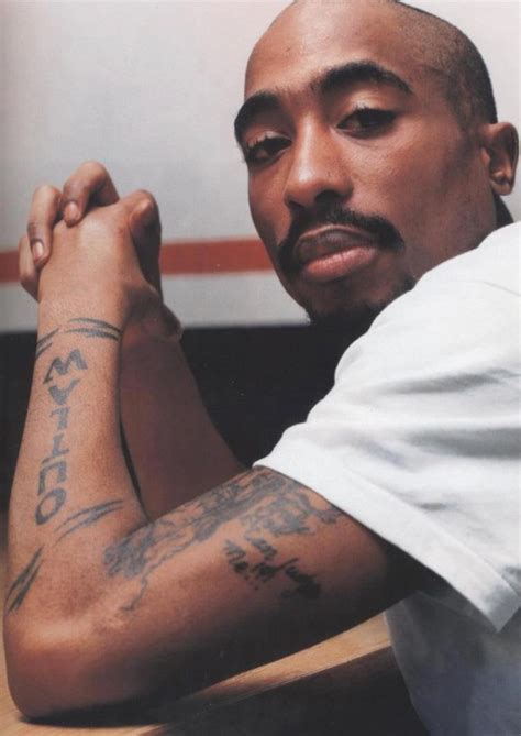 Tupacs Tattoos What Is The Meaning Of 2pacs Tattoos And Photos