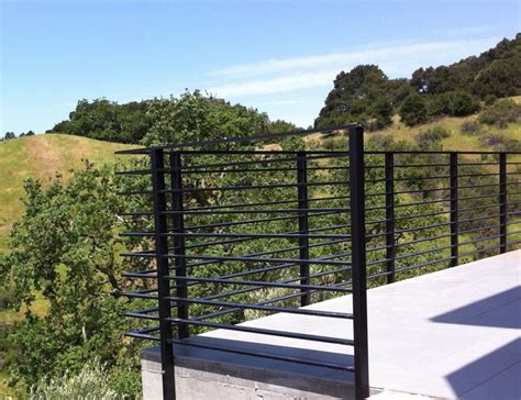 Flat steel bar can easily be bent into shape providing you have a decent vice and heavy hammer. Aluminum flat bar railing 2 - Deck Rail