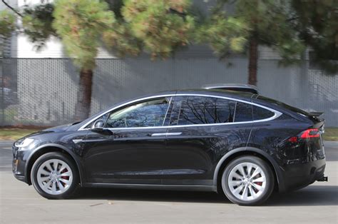 2016 Tesla Model X Debuts With 257 Mile Range Falcon Doors
