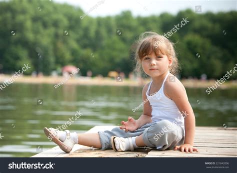 Young Girl Sitting Sitting Pier Stock Photo 221842006 Shutterstock