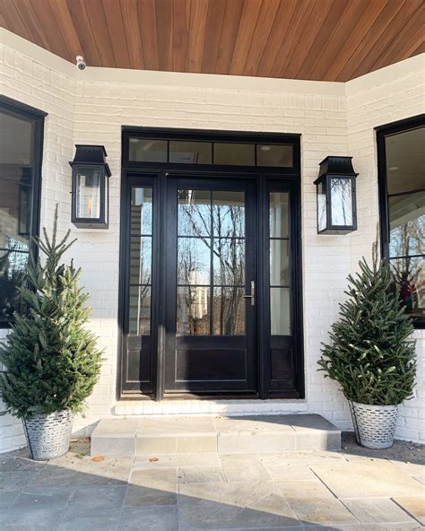 Planks doors in accents woodtones with custom elegant black the farmhouse exterior design totally reflects the entire style of the house and the family tradition as well. Blackard Modern Farmhouse (With images) | House exterior ...