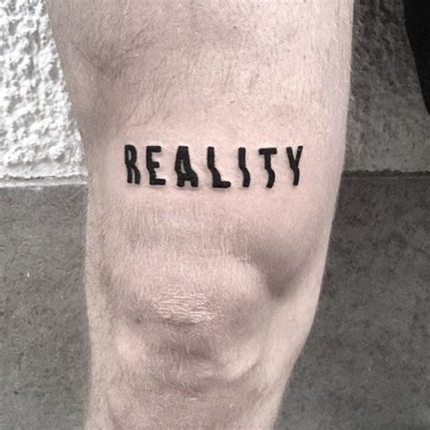 A Word Reality Inked In A Distorted Font On The Right Thigh By Julim Rosa Word Tattoos Body
