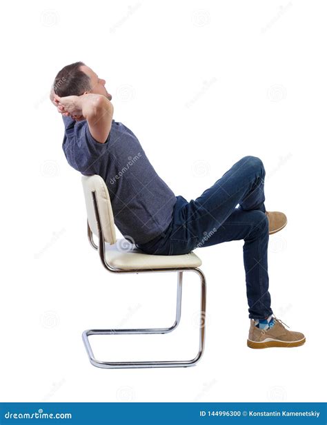 Side View Of A Man Sitting On A Chair Stock Photo Image Of View