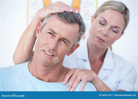 Doctor Stretching Her Patient Neck Stock Image Image Of Alternative