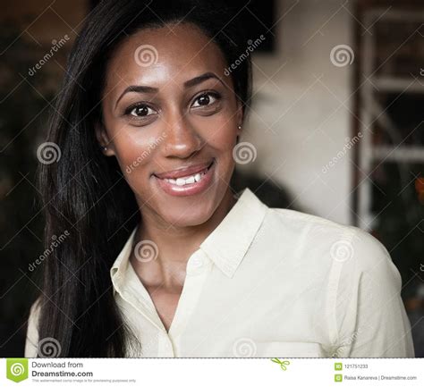 Close Up Portrait Of A Beautiful Young African American Woman Smiling