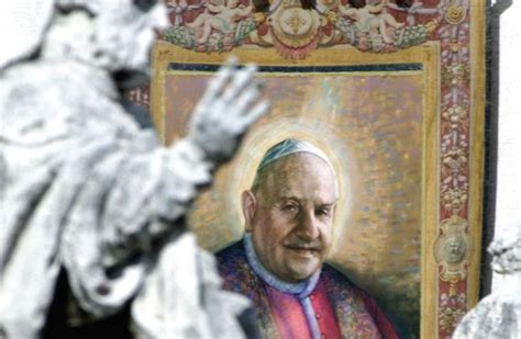 A Tapestry With The Image Of Pope John Xxiii Hangs On The