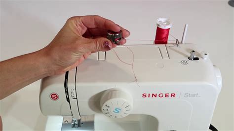 How To Thread A Bobbin On A Singer Sewing Machine Sewing Machine