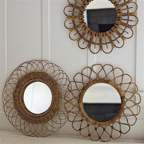 Michael's sells these mirrors for $5. Rattan Woven Round Geometric Mirrors