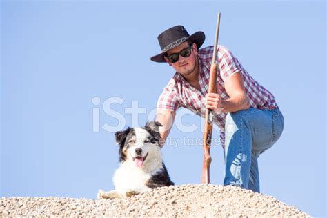 Young Farmer With Dog Stock Photo Royalty Free Freeimages
