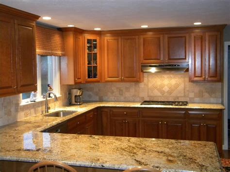 When you create a granite backsplash it is important to note that they are supposed to be tight together with the beveled edges. Granite and Backsplash Combinations | Namibian Gold ...