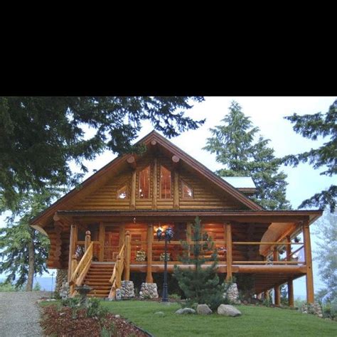 Built by real log homes who has over 50 years of experience and is one of the oldest names in log homes and log cabins building industry. Log home with wrap around porch. Like the offset steps and ...