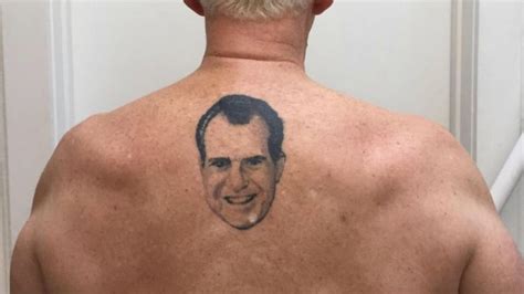 roger stone has a nixon tattoo on his upper back body tattoo art