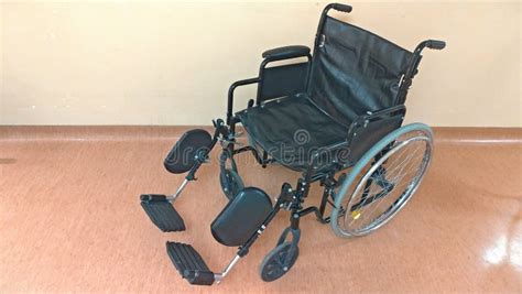 Disabled Carriage Black Wheelchair In The Hospital For The