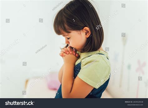 Cute Little Girl Praying Home Stock Photo 2035519538 Shutterstock