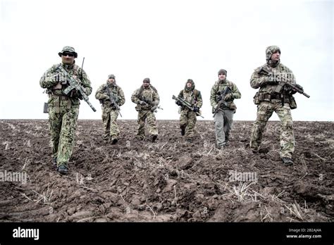 Army Soldiers On March Elite Forces Fighters Group Commando Tactical