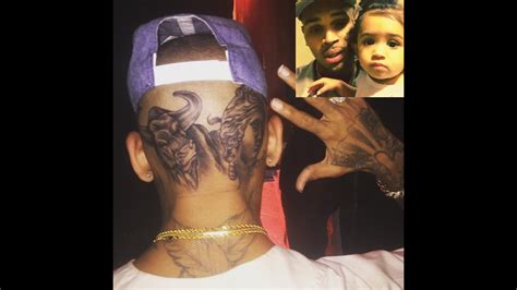 Chris Brown Explains The Meaning Behind The 2 Tattoos On The Back Of