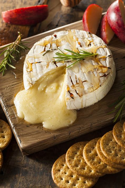Round cheeses such as brie should be cut like a cake in small triangular wedges roughly the width of a pencil. Easy Baked Brie Cheese Appetizer Recipe With Honey ...