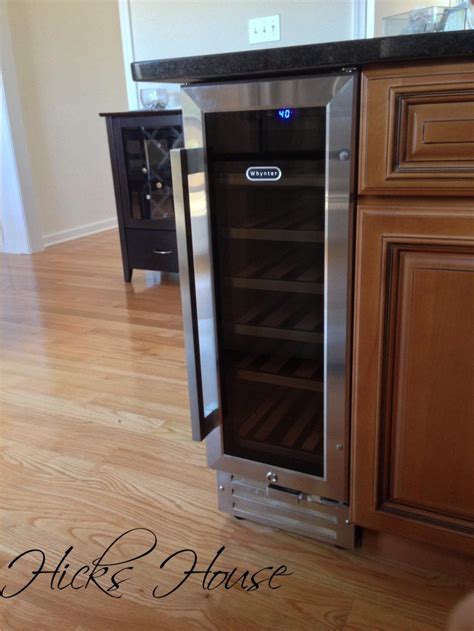 The cabinet with the fridge & some electrical components installed. Wine a Little | Hicks House | Wine fridge, Diy kitchen ...