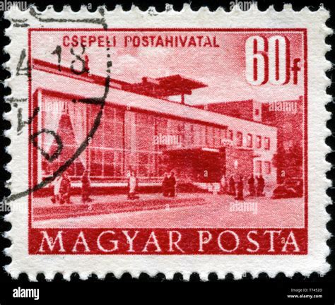 Postage Stamp From Hungary In The Buildings Of The Five Year Plan In