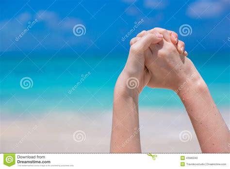 Close Up Of Female Hands On White Sandy Beach Stock Photo Image Of