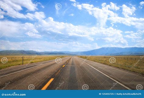 A Highway Disappearing Into The Horizon Stock Image Image Of Rural