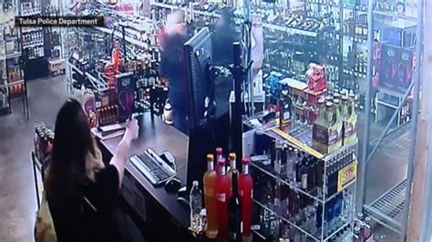 gun toting mom and daughter shoot armed liquor store robber metro news