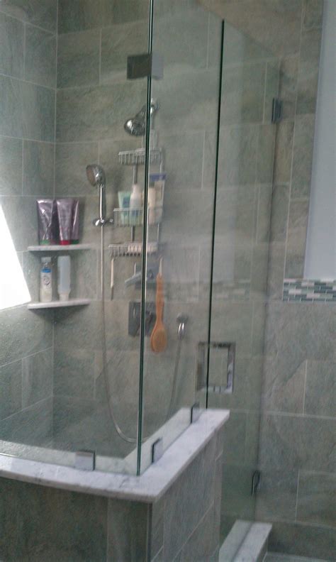 Staggered tile on shower is uneven. 13x13 porcelain tile installed in a staggered brickbond ...