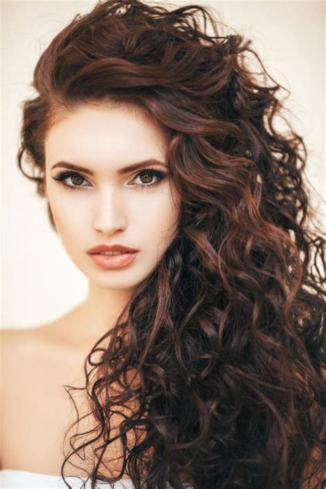 Beautiful model woman with curly hairstyle. Long Hair with Short Layers: The Secret to Built-In Volume ...