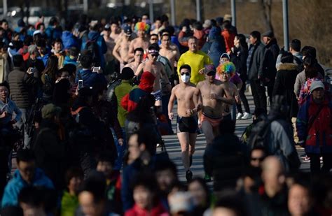photos beijing s naked run has no actual naked people that s beijing