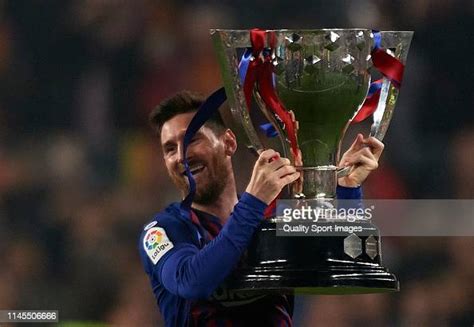 Lionel Messi Of Barcelona Lifts The La Liga Trophy After The La Liga