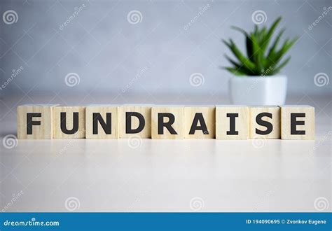 Fundraisie Word Written On Wood Block Fundraising Text On Table