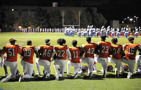 Oak Park River Forest Football Players Band Members Kneel During