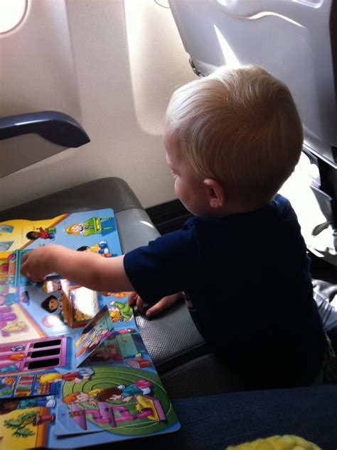 8 Tips For Airplane Travel With Kids North Of Something
