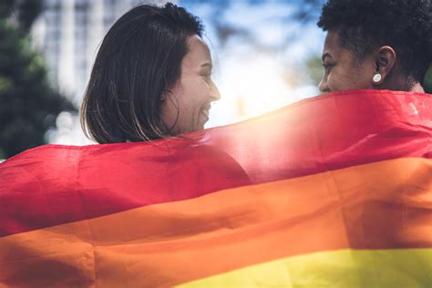 Lesbian Couple With Rainbow Flag Go Magazine